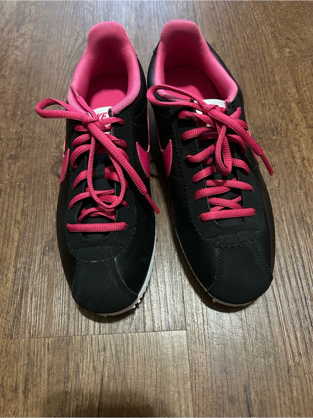 Nike Women’s Black and Hot Pink Low-Top Sneakers
